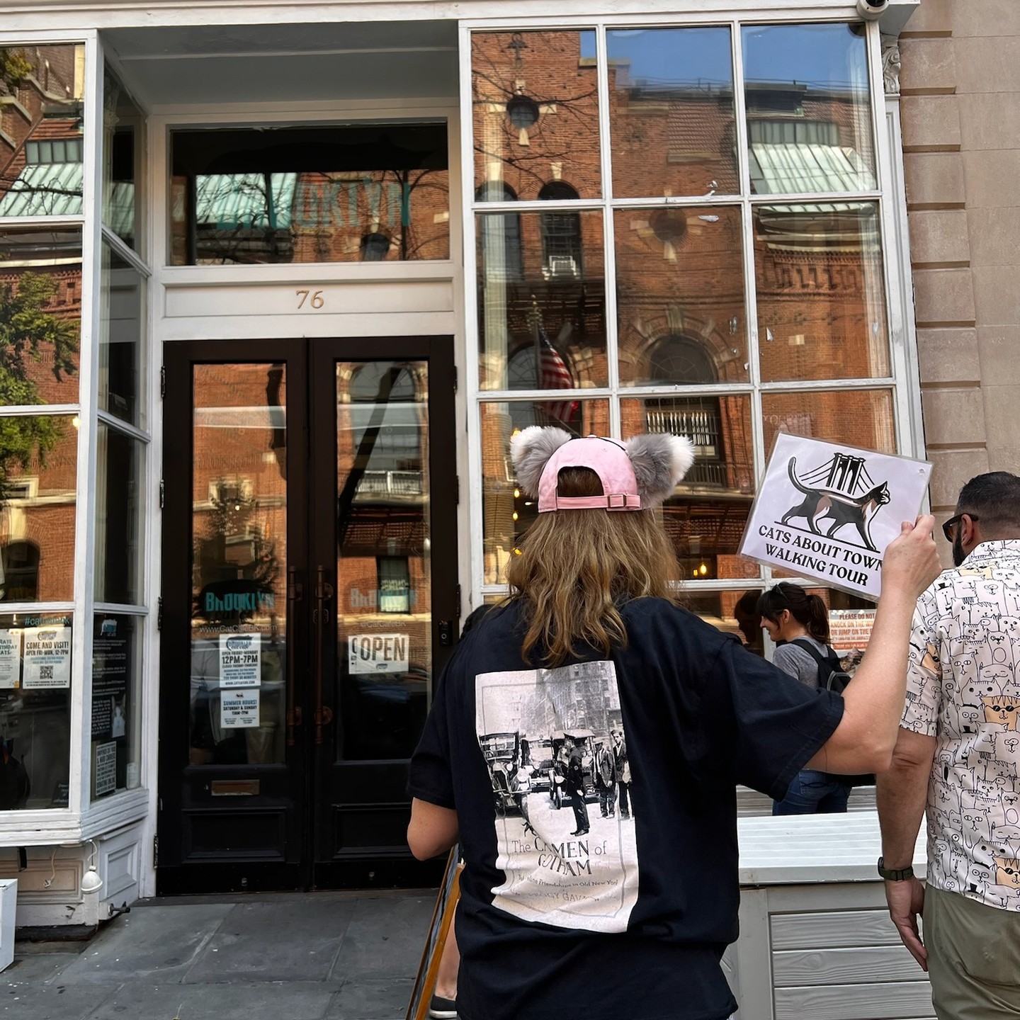 Lower East Side cat tour guests at historic neighborhood location