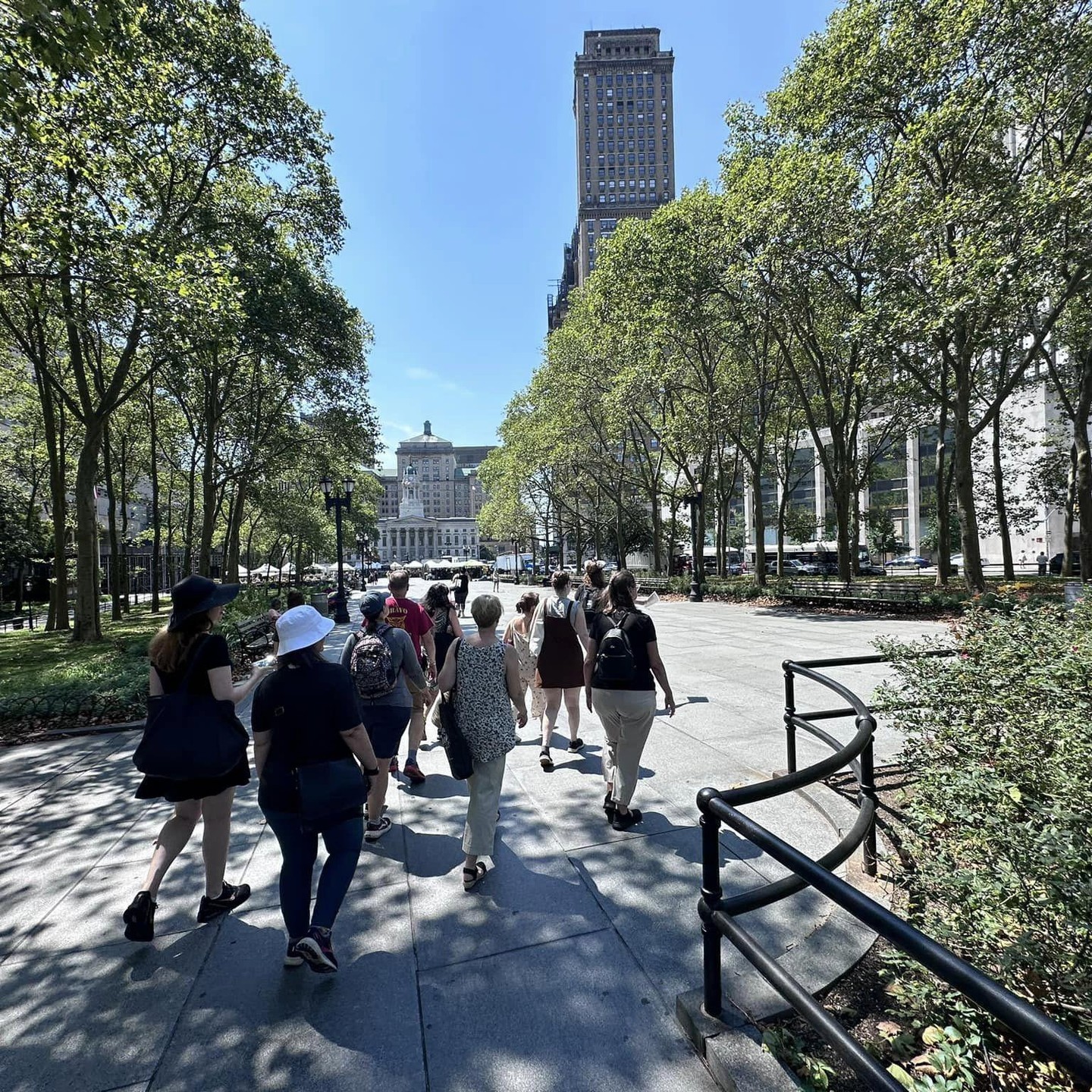 Tour group exploring Brooklyn Heights promenade on cat history tour